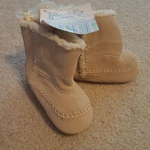 Never worn, NWT imitation baby UGGs